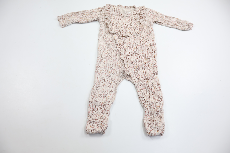 Blommig jumpsuit med volang från Hust & Claire - Storlek 62 - Beige