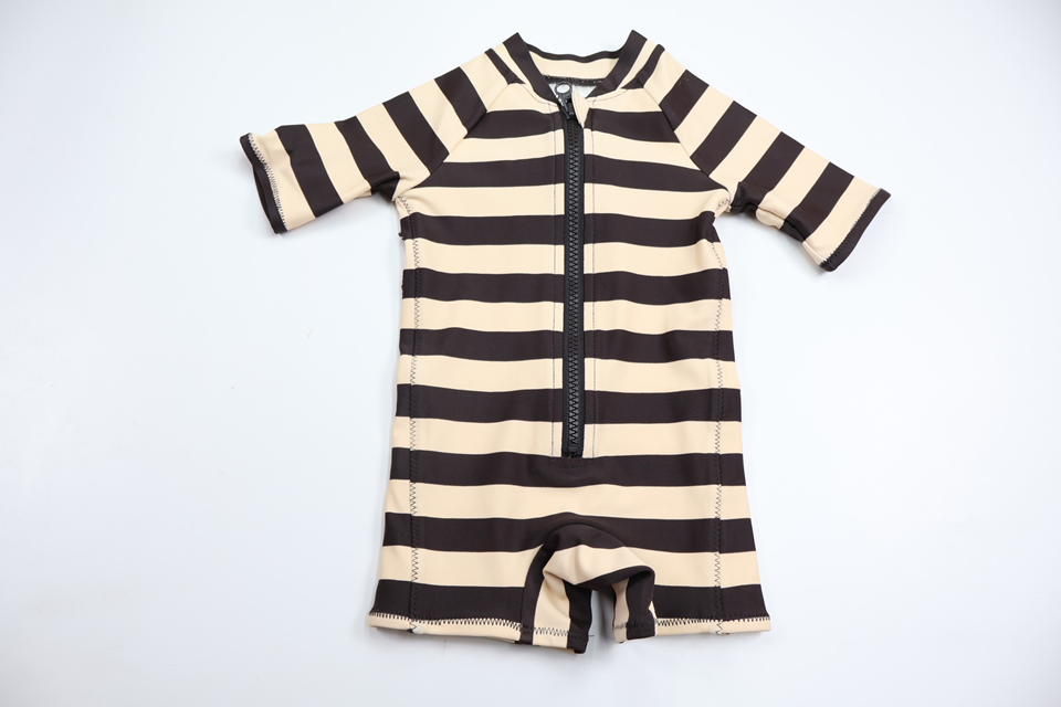 UV-dräkt från H&M - Storlek 68 - Beige