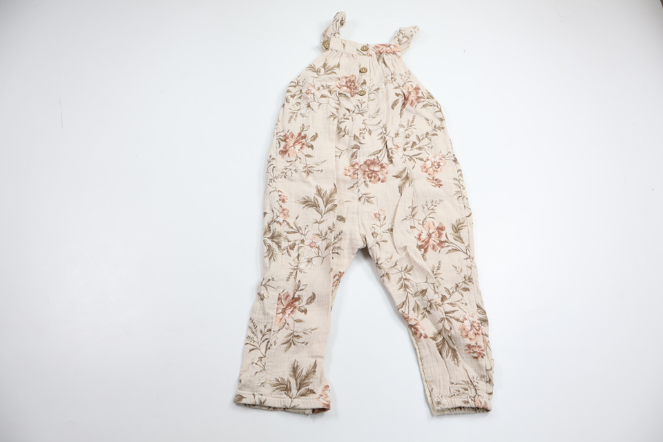 Blommig jumpsuit från Newbie - Storlek 86 - Benvit