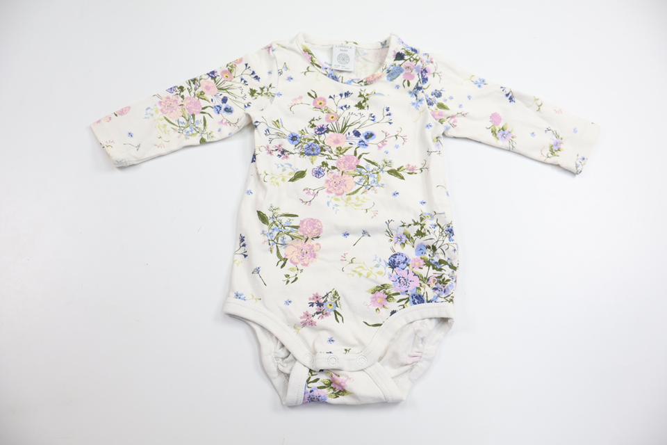 Blommig body från Lindex - Storlek 62 - Vit