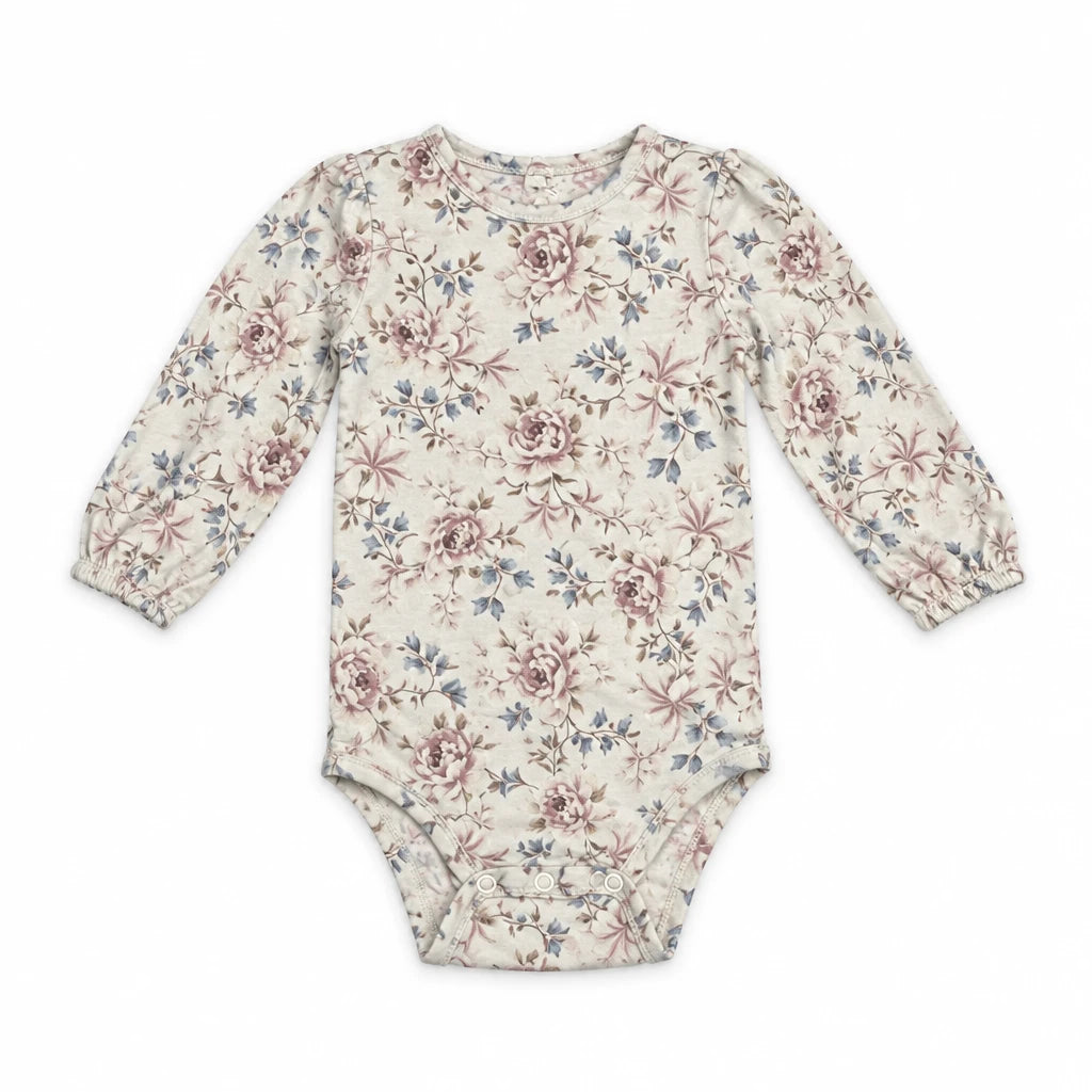 Bodysuit med blommönster från Newbie - Storlek 86 - Benvit