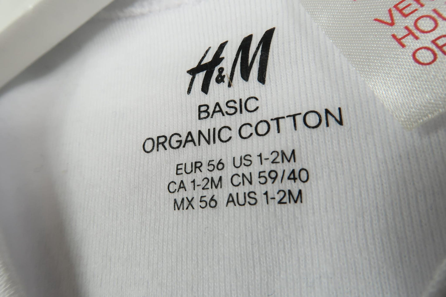 KORTÆRMET ENHJØRNINGSBODYSUIT FRA H&M - STØRRELSE 56