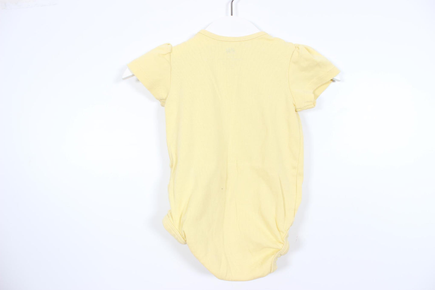 Gul kortærmet bodysuit fra H&M i størrelse 74