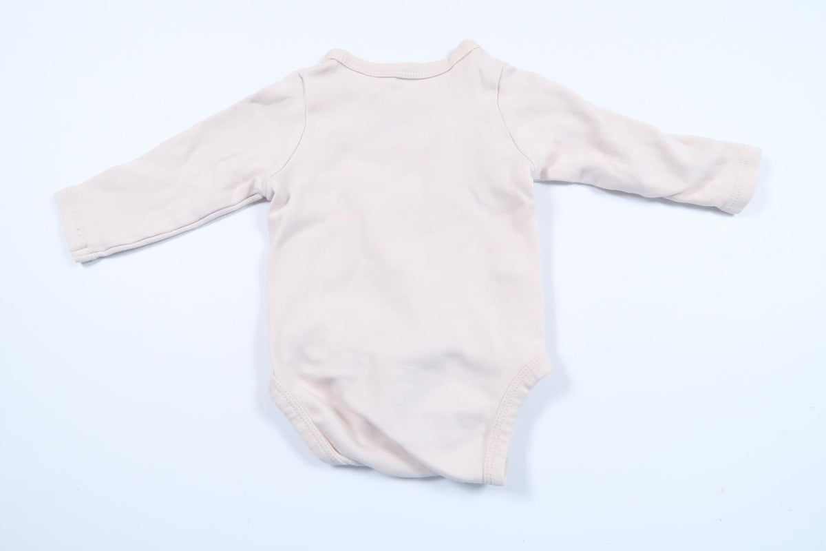 Lyserød bodysuit fra H&M i størrelse 56