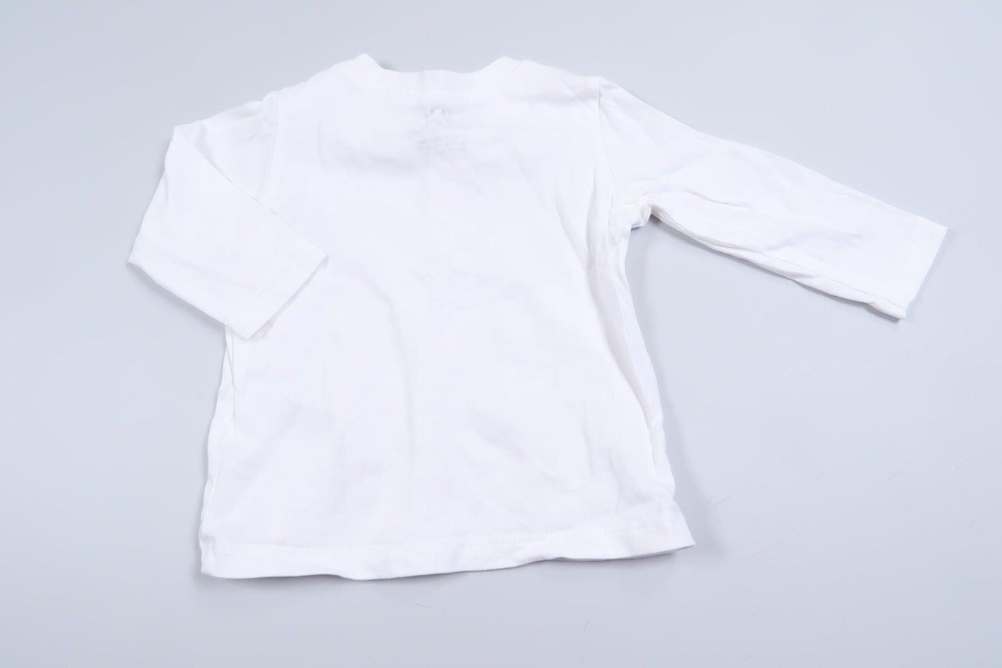 Hvid langærmet skjorte fra H&M i størrelse 62