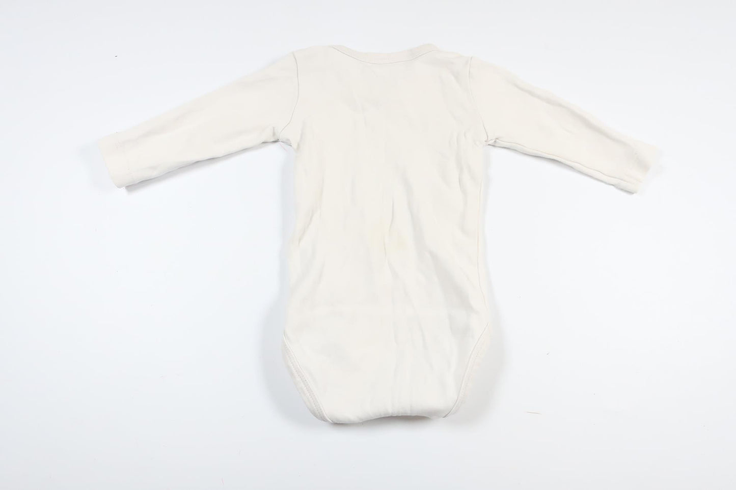 Hvid langærmet bodysuit med bjørn fra Name It i størrelse 62