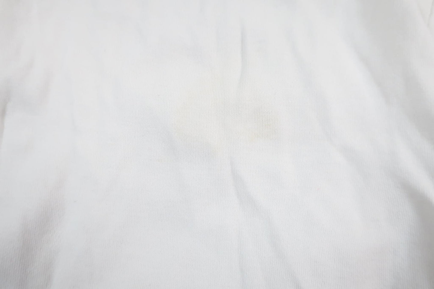 Hvid langærmet bodysuit med bjørn fra Name It i størrelse 62