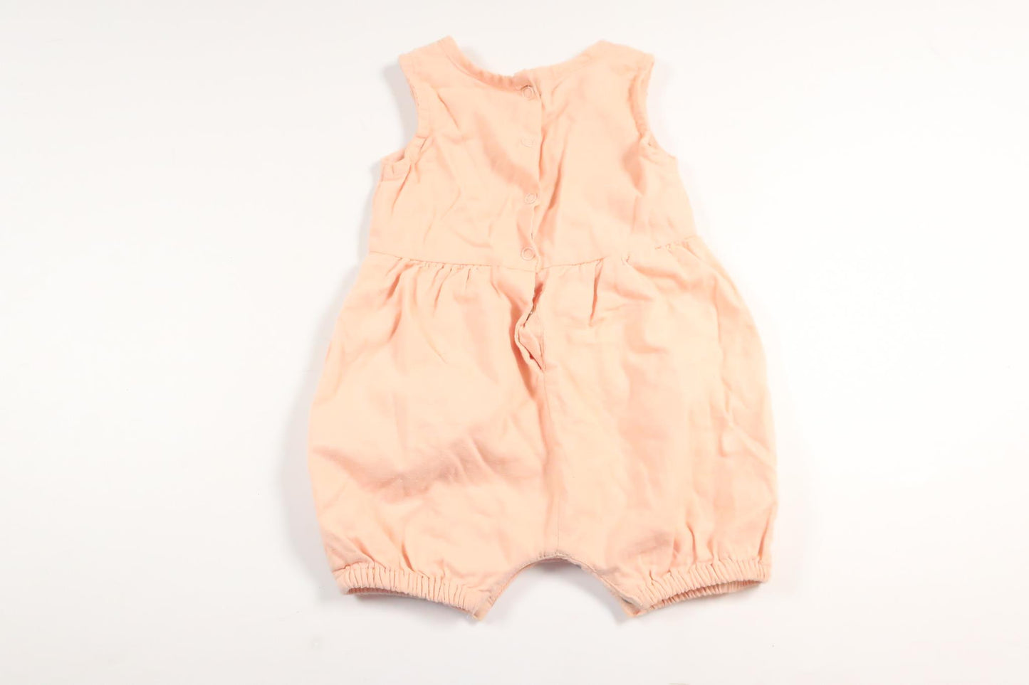 Lyserød jumpsuit fra Name It i størrelse 56