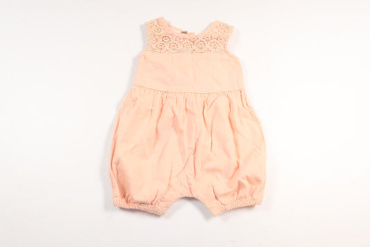 Lyserød jumpsuit fra Name It i størrelse 56