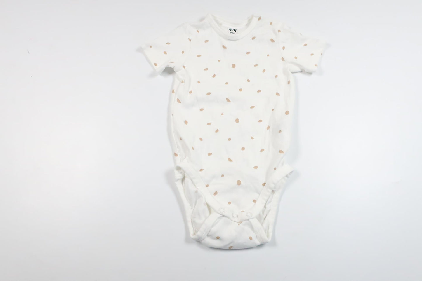 Prikket bodysuit fra H&M - Størrelse 74/80 - Hvid