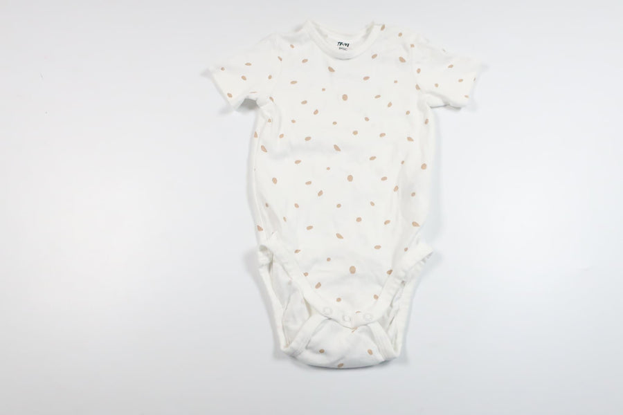 Prikket bodysuit fra H&M - Størrelse 74/80 - Hvid