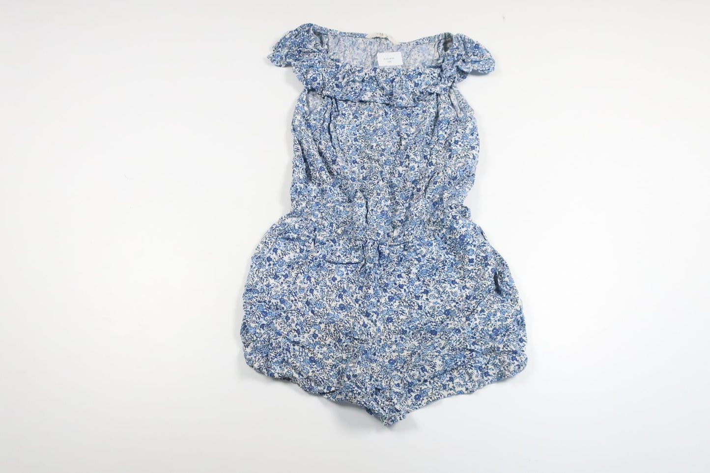 Blomsterjumpsuit fra H&M - Størrelse 128 - Blå