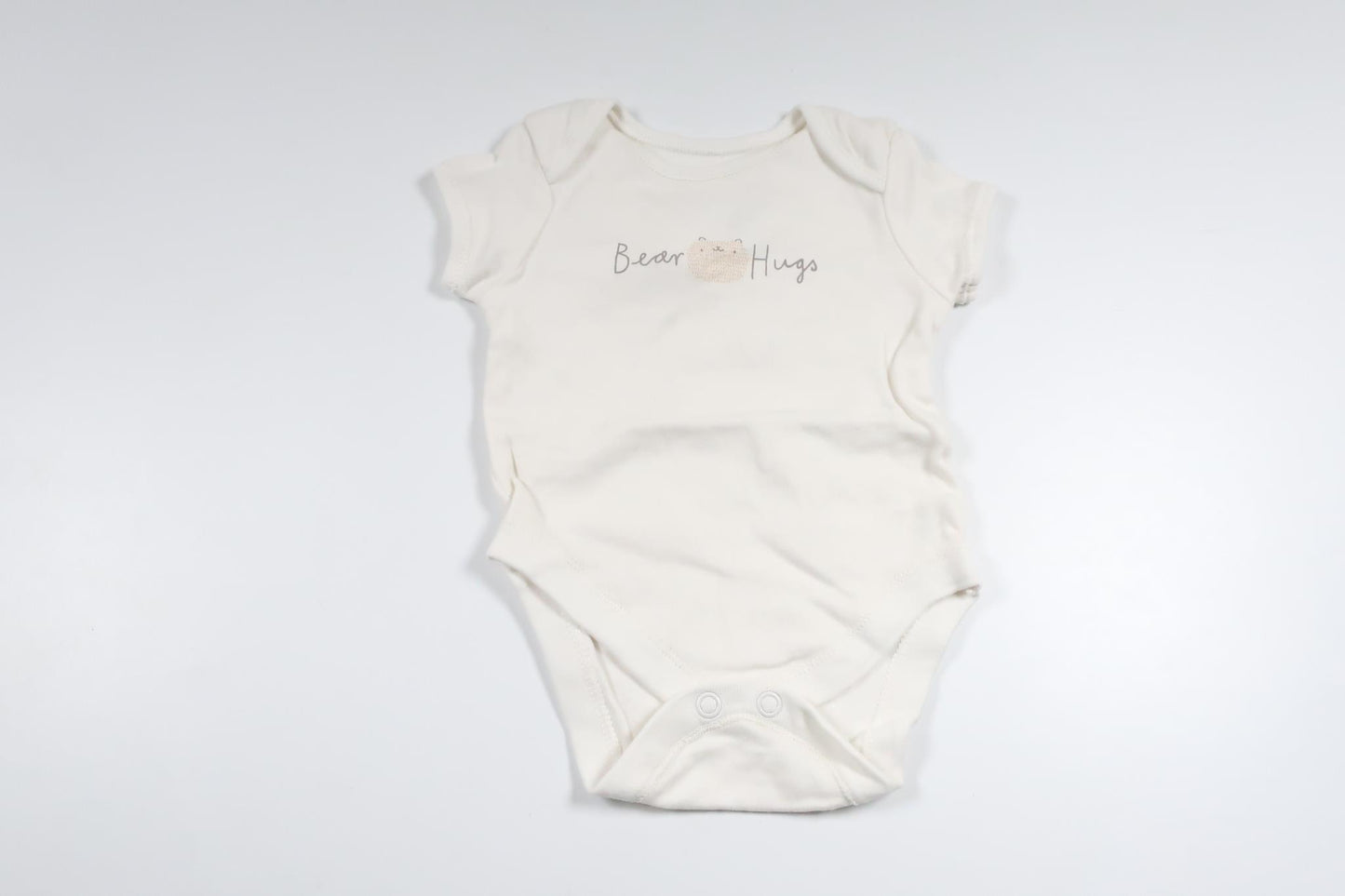 Bodysuit fra Primark - Størrelse 62 - Hvid