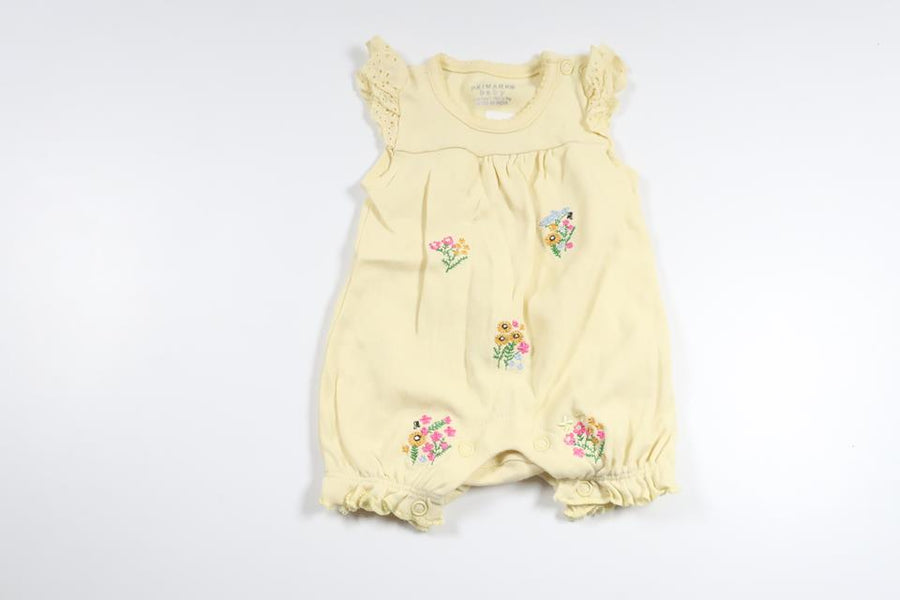 Blomsterjumpsuit fra Primark - Størrelse 50/56 - Gul