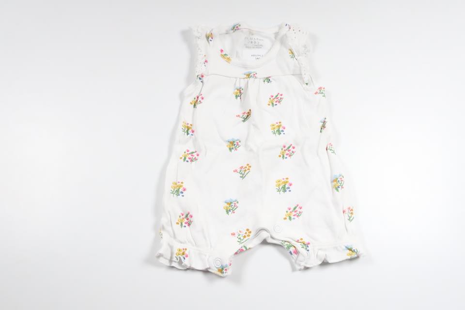 Blomsterjumpsuit fra Primark - Størrelse 50/56 - Hvid