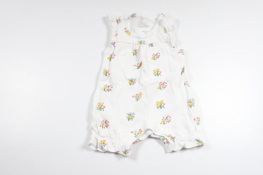 Blomsterjumpsuit fra Primark - Størrelse 50/56 - Hvid