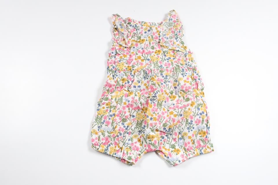Blomsterjumpsuit fra Primark - Størrelse 50/56 - Multifarvet