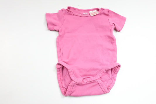 Bodysuit fra H&M - Størrelse 56 - Lyserød