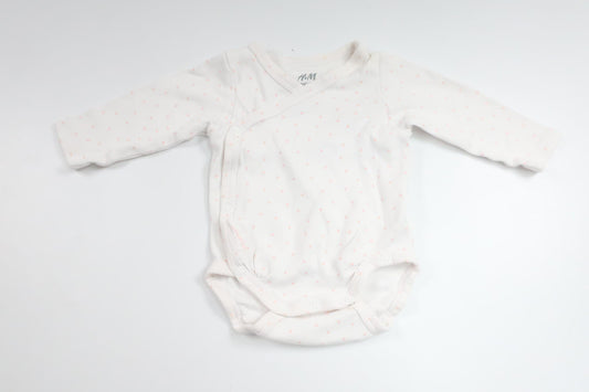 Wrap-body med prikker fra H&M - Størrelse 50 - Hvid