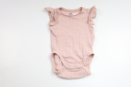 Bodysuit fra H&M - Størrelse 56 - Lyserød
