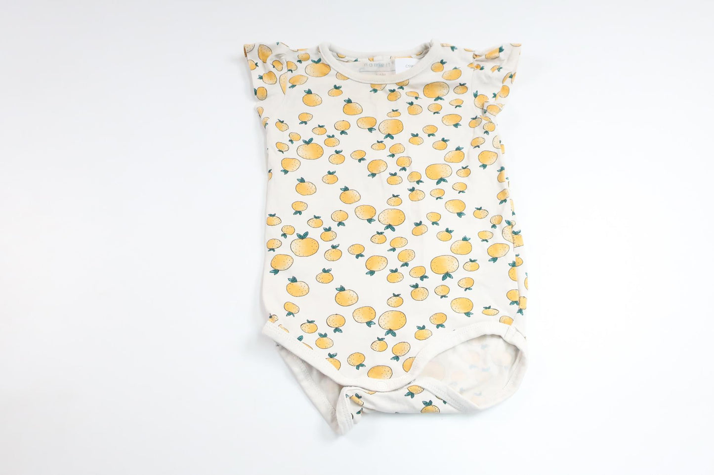 Bodysuit med appelsiner fra Name It - Størrelse 68 - Hvid