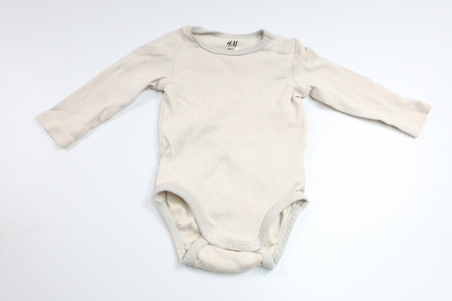 Bodysuit fra H&M - Størrelse 62 - Beige
