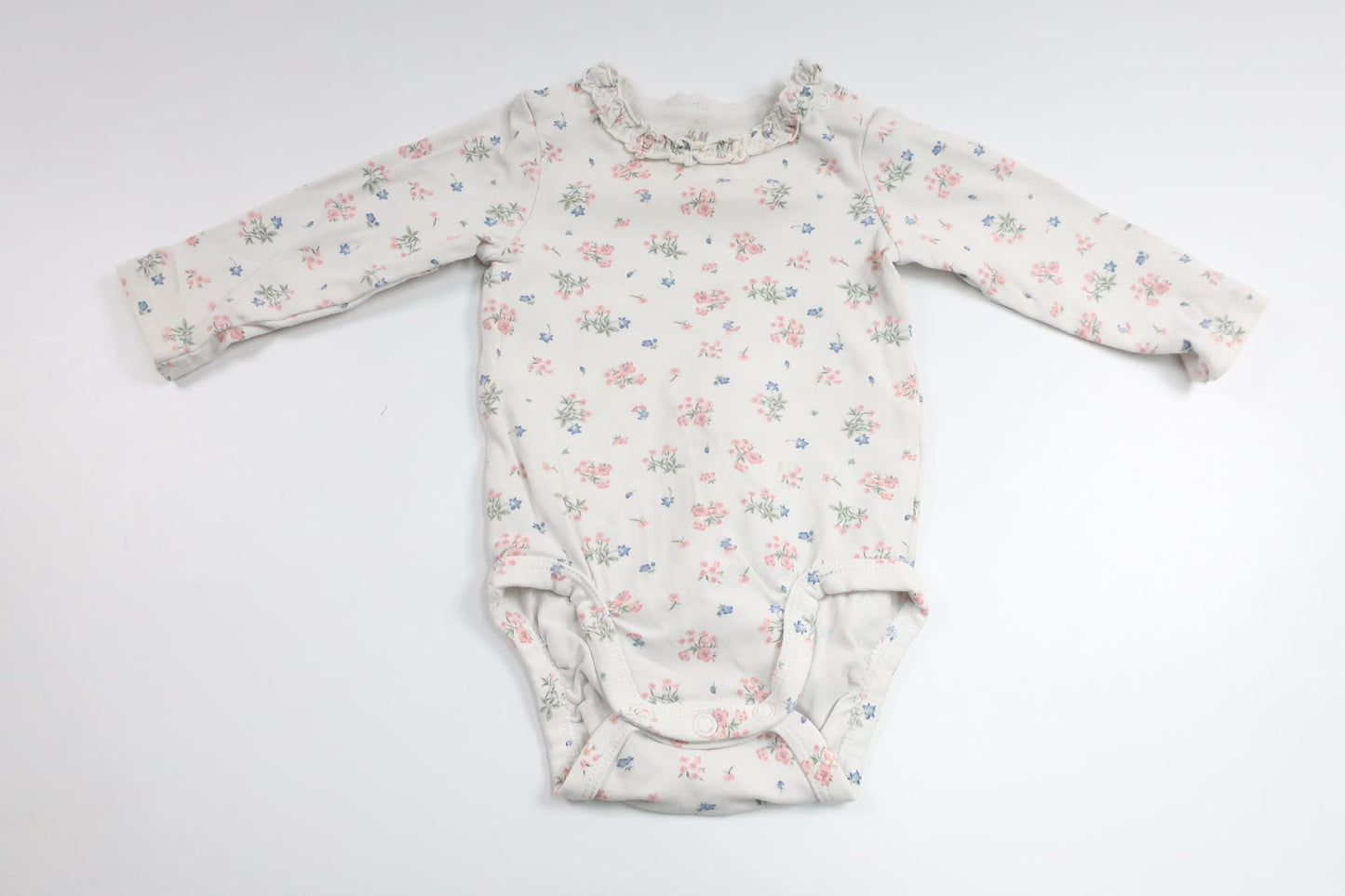 Blomsterbody fra H&M - Størrelse 56 - Hvid