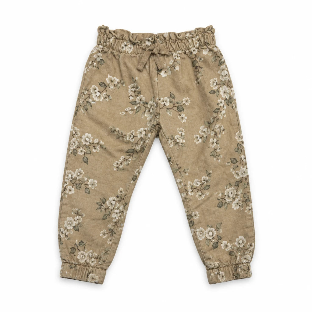 Blommiga mjukisbyxor från Newbie - Storlek 80 - Beige