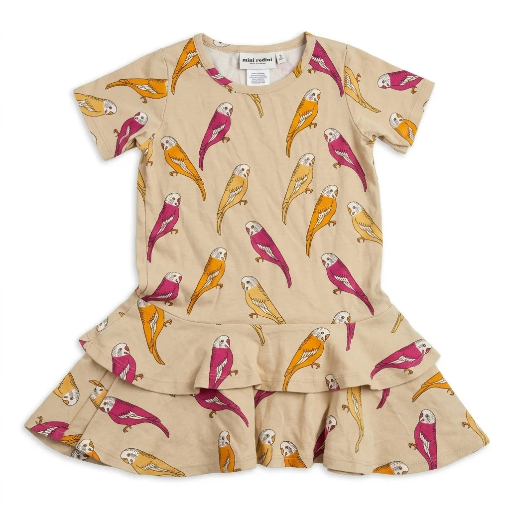 Djurmönstrad klänning från Mini Rodini - Storlek 116/122 - Beige
