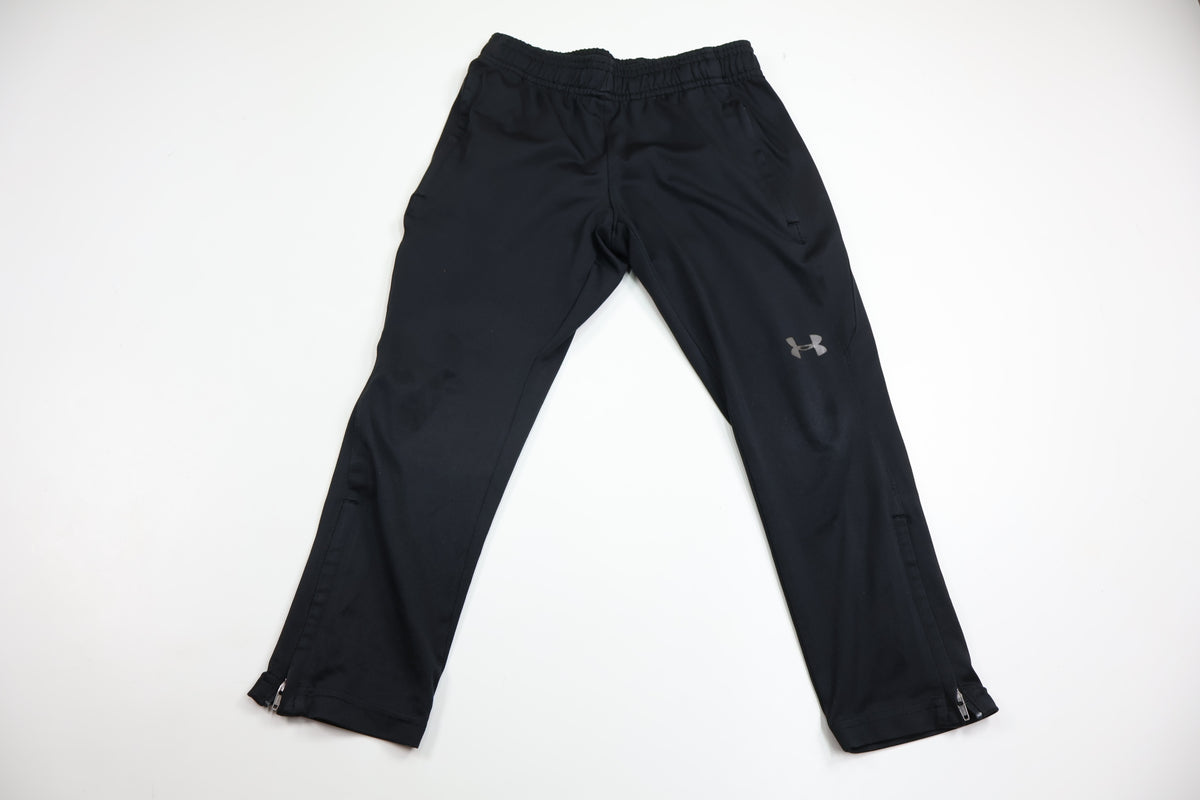 Träningsbyxor från Under Armor - Storlek 110/116 - Svart