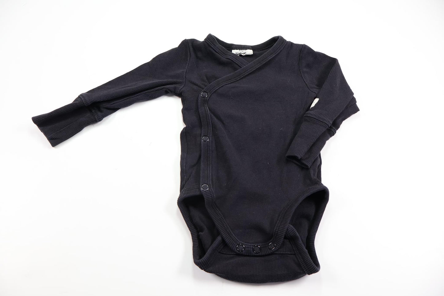 Ribbet wrap-body fra Kappahl - Størrelse 62 - Sort