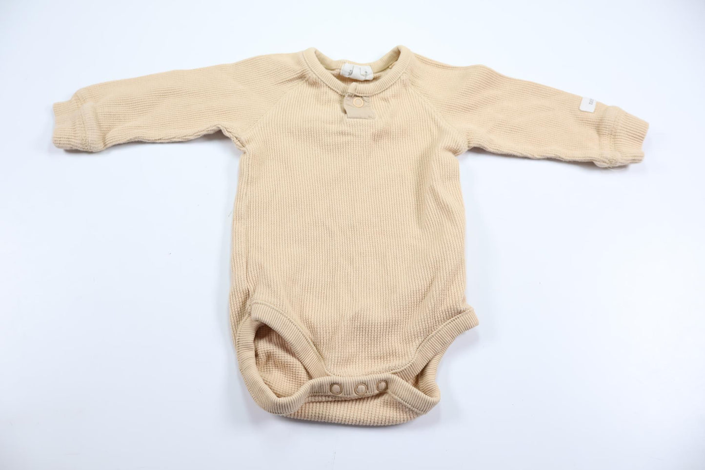 Bodysuit fra Newbie - Størrelse 62 - Beige