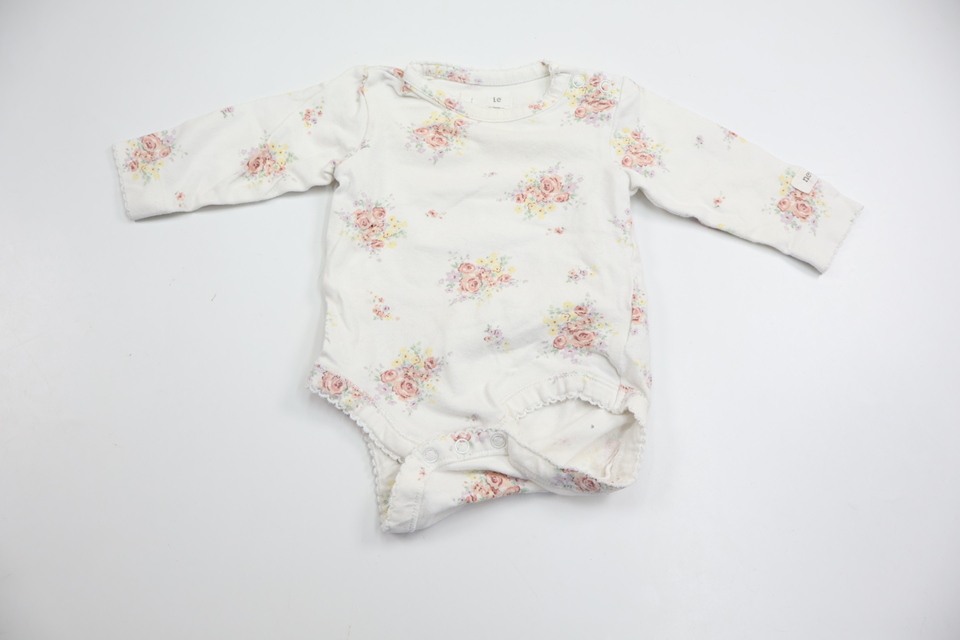 Blommig body från Newbie - Storlek 56 - Vit