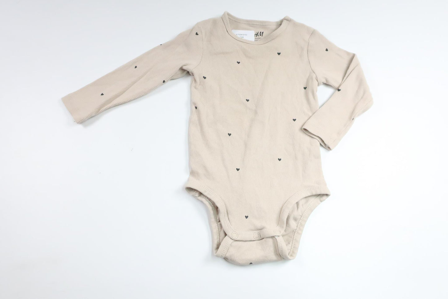Ribbet bodysuit fra H&M - Størrelse 74 - Beige