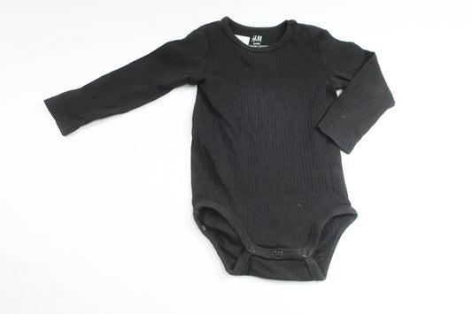 Ribbet bodysuit fra H&M - Størrelse 74 - Sort