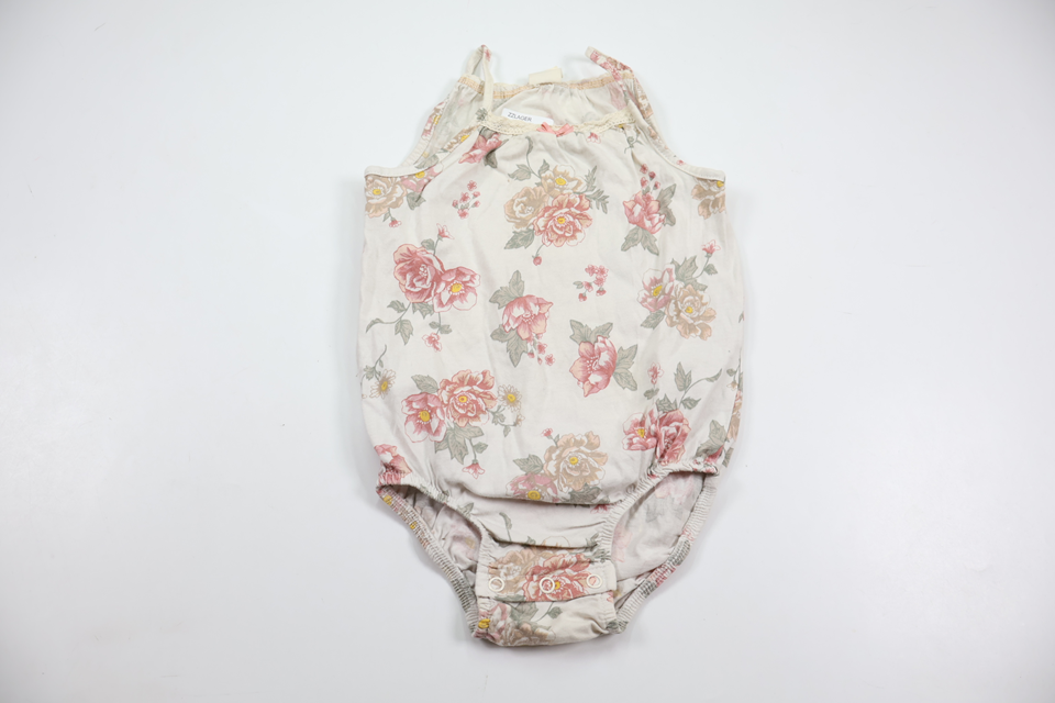 Blomstret body fra H&M - Størrelse 86 - Hvid