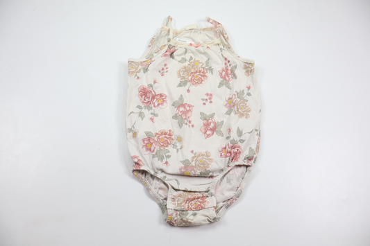Blomstret body fra H&M - Størrelse 86 - Hvid