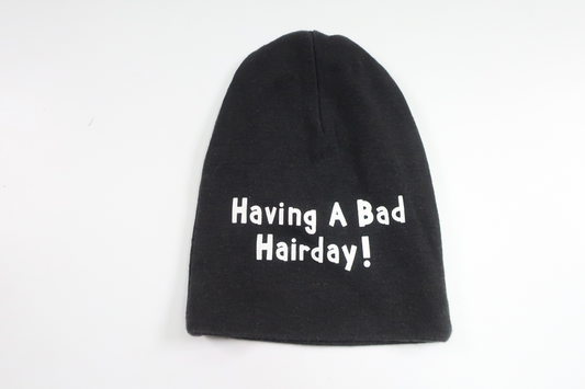 Hue "Having a Bad Hair Day" fra Åhléns - Størrelse 40/42 - Sort
