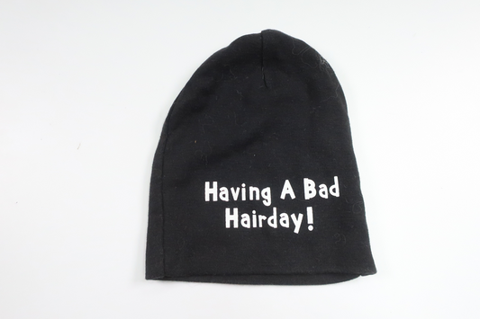 Hue "Having a Bad Hair Day" fra Åhléns - Størrelse 44/46 - Sort