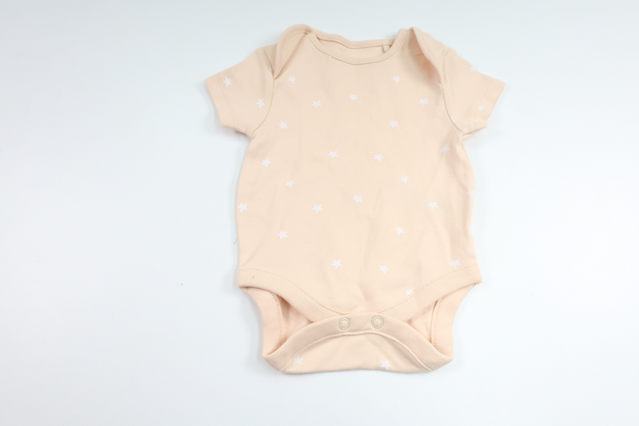 Bodysuit med stjerner fra Next - Størrelse 50/56 - Beige