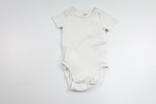 Bodysuit fra H&M - Størrelse 62 - Hvid