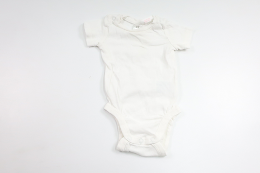 Bodysuit fra H&M - Størrelse 62 - Hvid