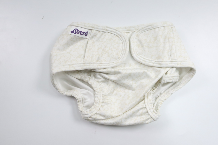 Justerbar stofble fra Libero - Størrelse 56/62 - Beige