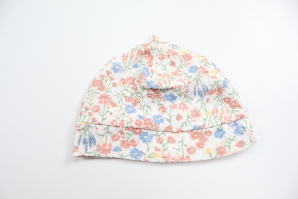 Blommig mössa från H&M - Storlek 50 - Multi
