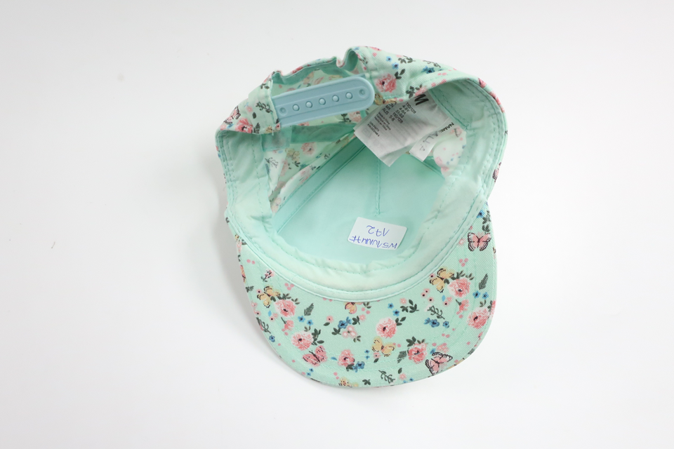 Blomstret kasket fra H&M - Størrelse 110/128 - Blå